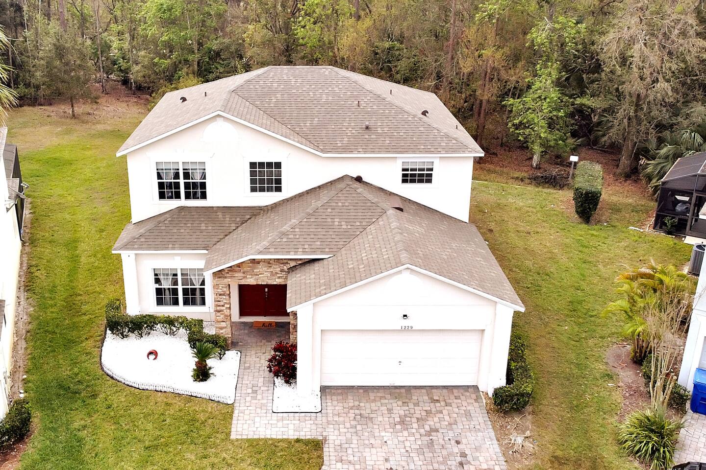 Stunning 5 bedroom pool home in gated community minutes from Disney