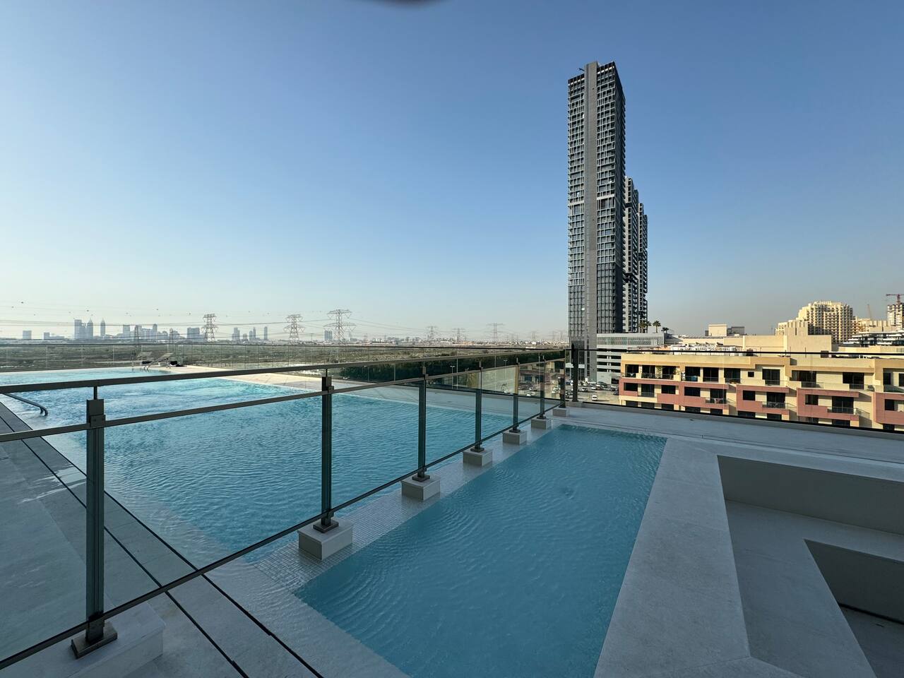 ASHRI Luxe Apt in JVC I Amazing Pools I Smart Home — Dubai — vacation rental
