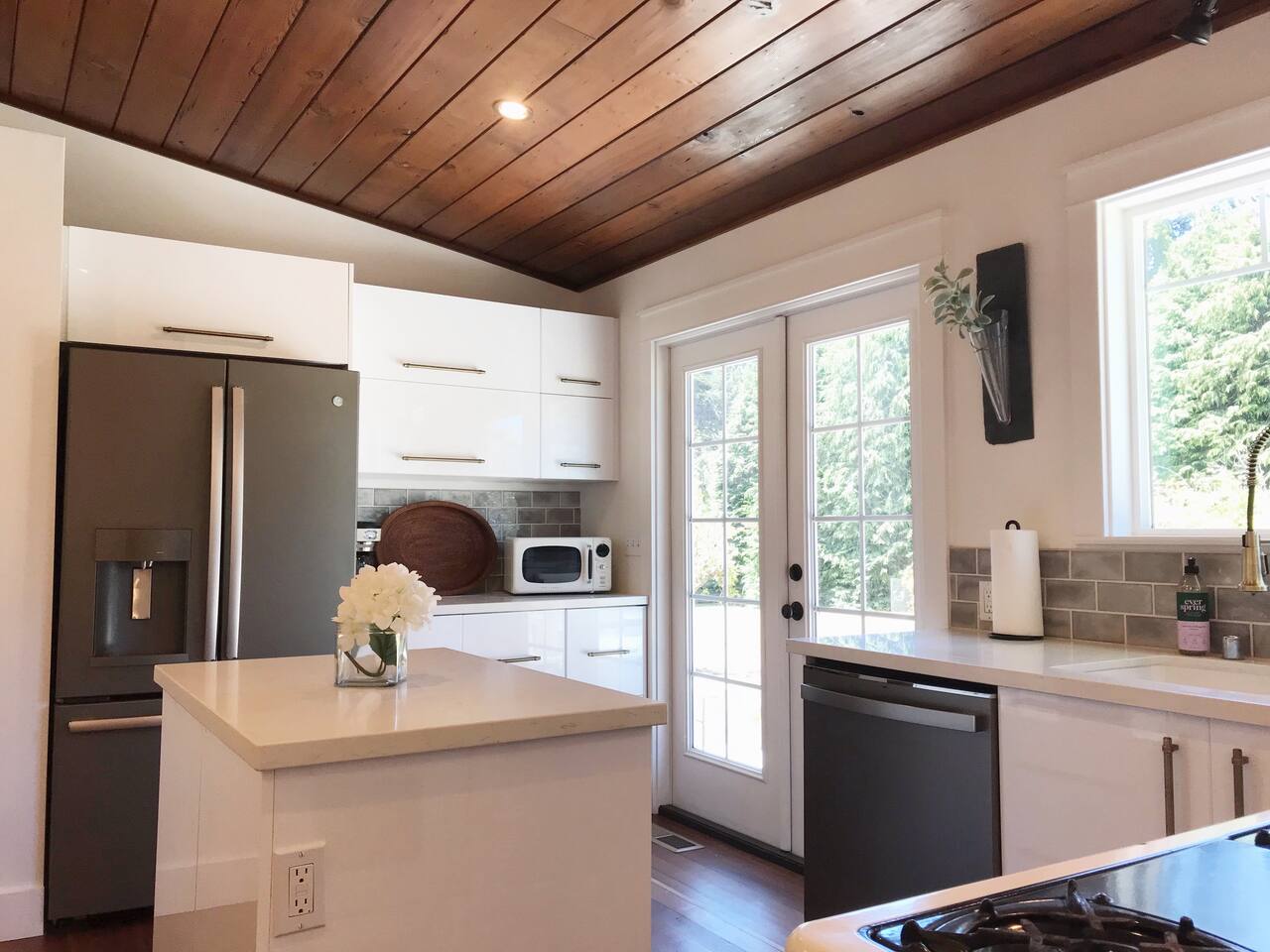 Elegant farmhouse home on beautiful apple orchard