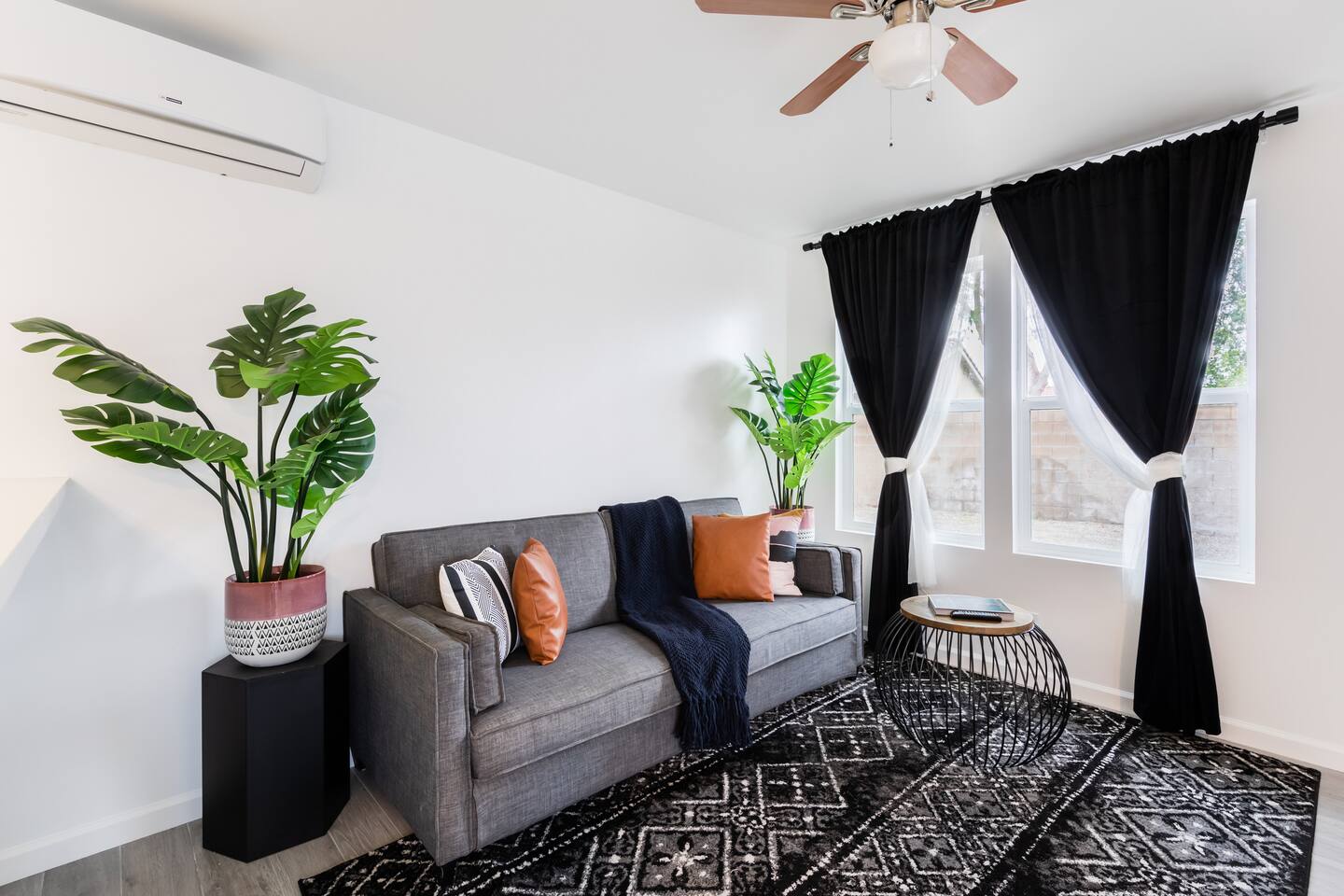 Striking Black & White Apt w Gated Entrance & Yard