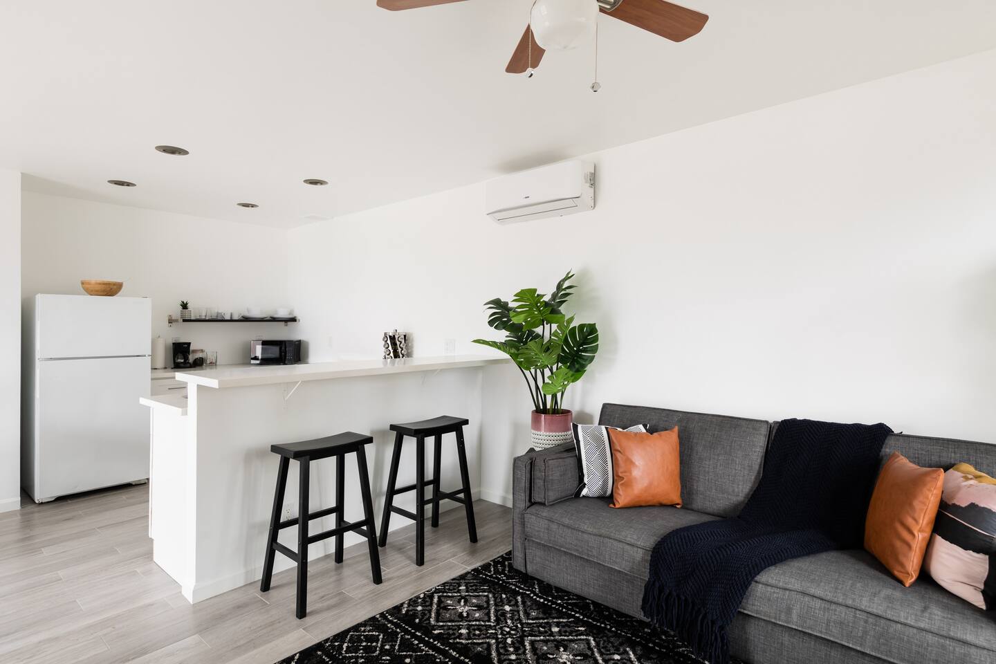 Striking Black & White Apt w Gated Entrance & Yard