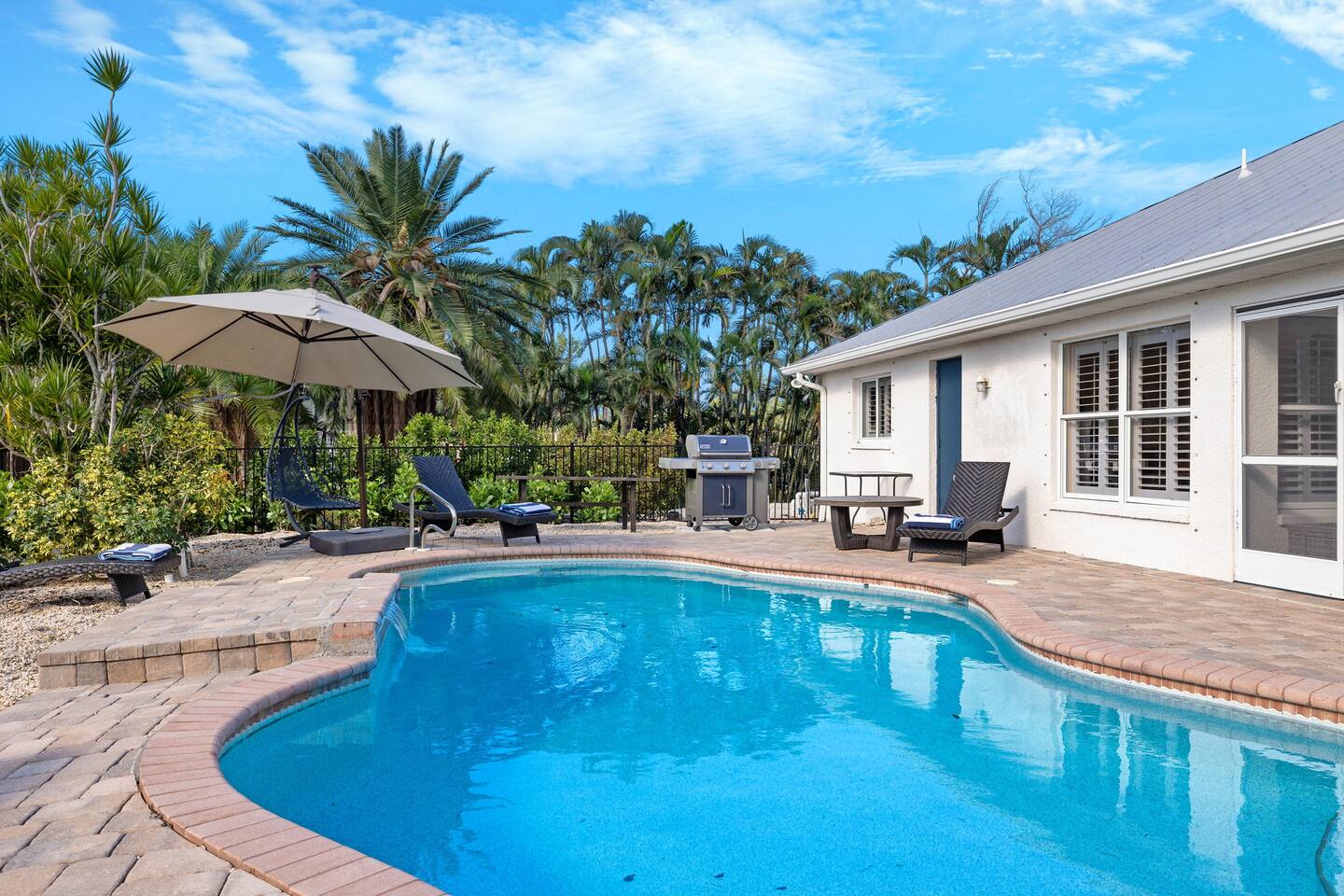 Iona Palms Retreat Heated Pool by Sanibel and FMB