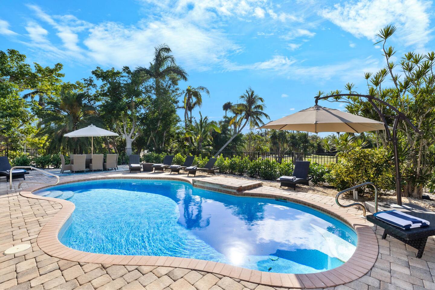 Iona Palms Retreat Heated Pool by Sanibel and FMB