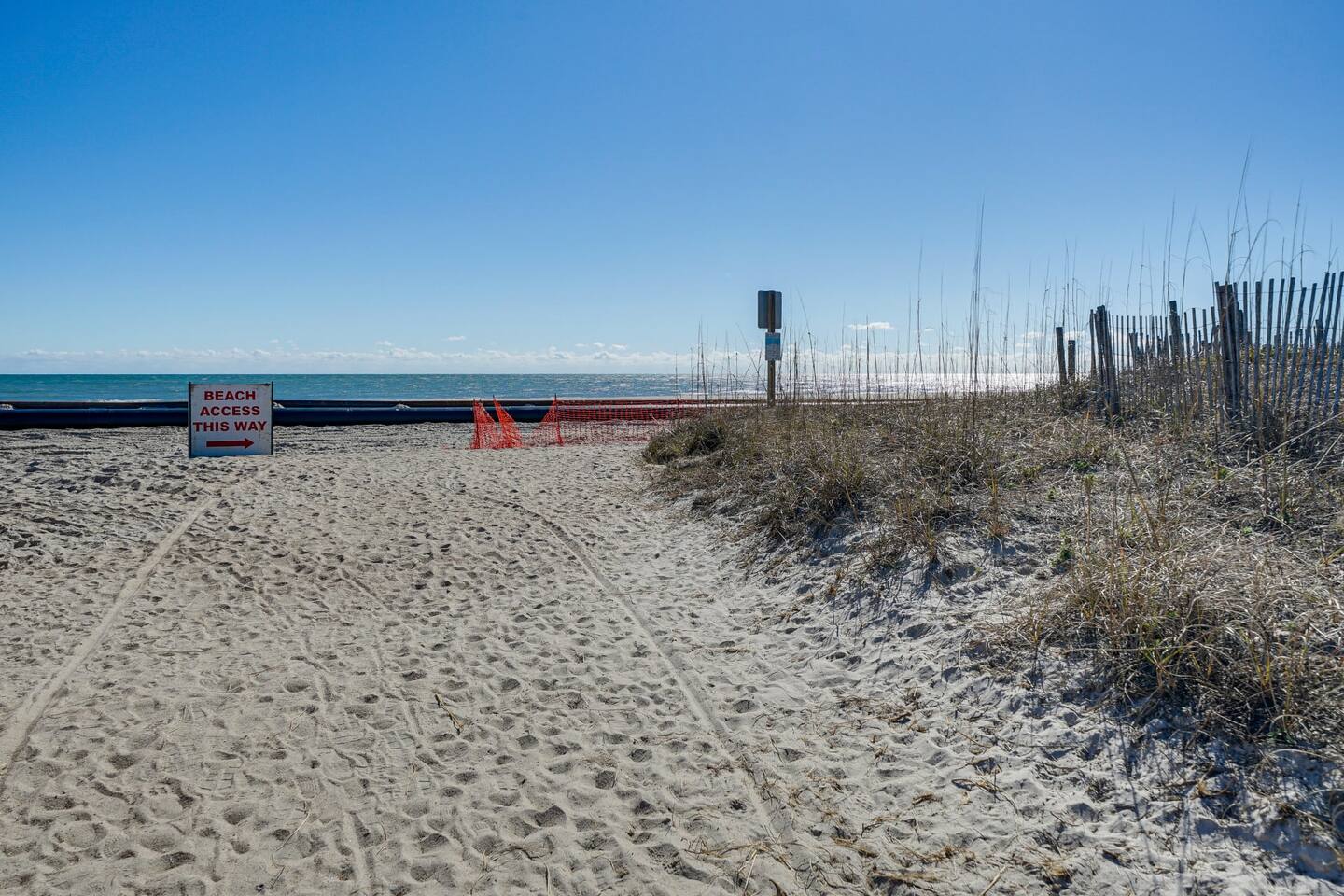 5 min Walk to Beach + Shops + Loop Access + Food