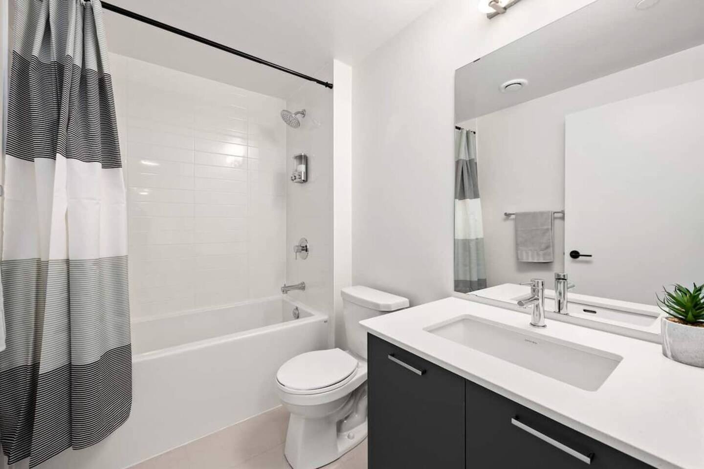 Elegant 4BR Condo with City Views & Free Parking