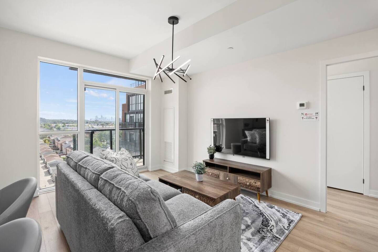 Elegant 4BR Condo with City Views & Free Parking