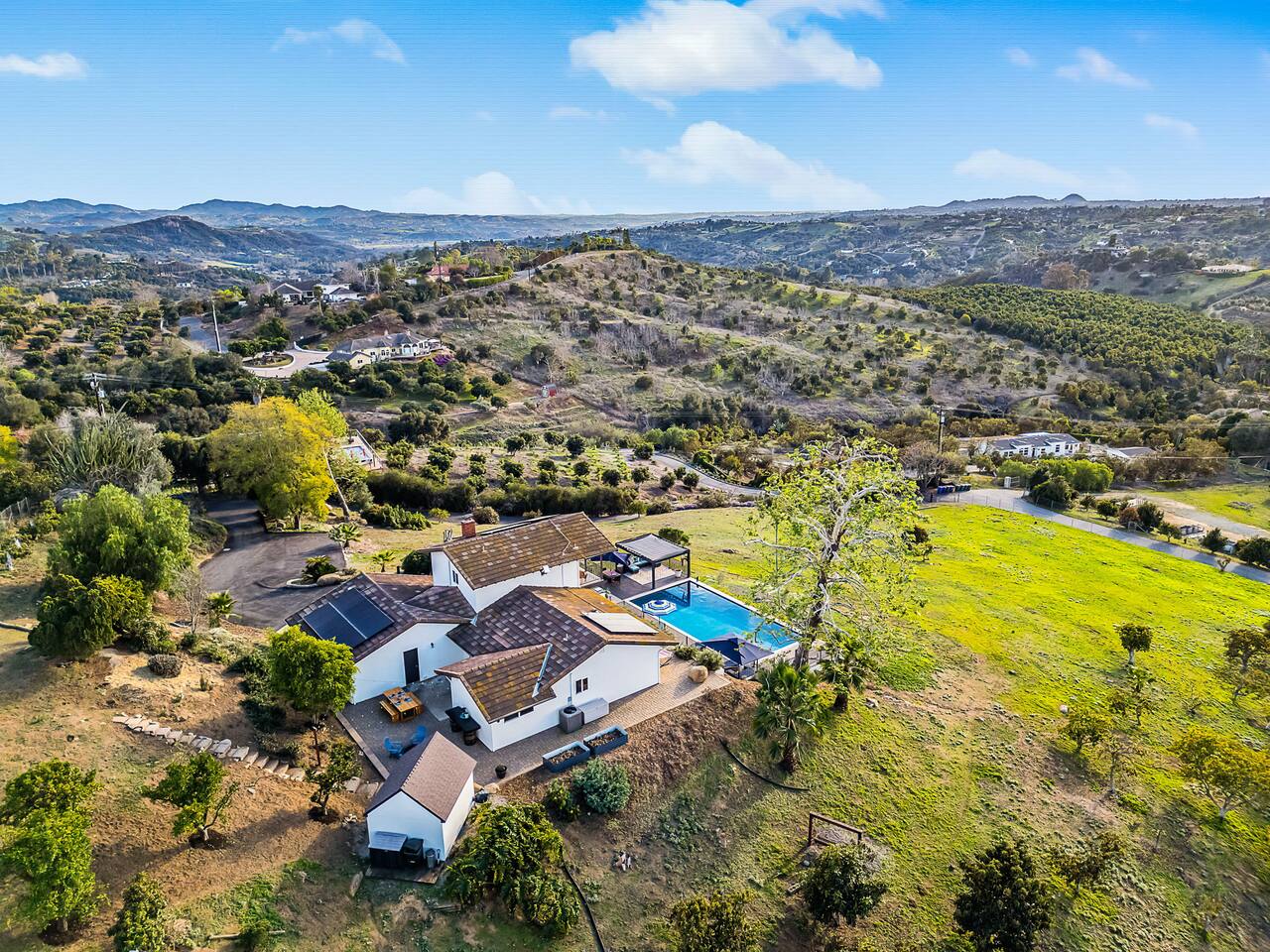 Rolling hills and vineyards in Fallbrook — a short walk to the winery
