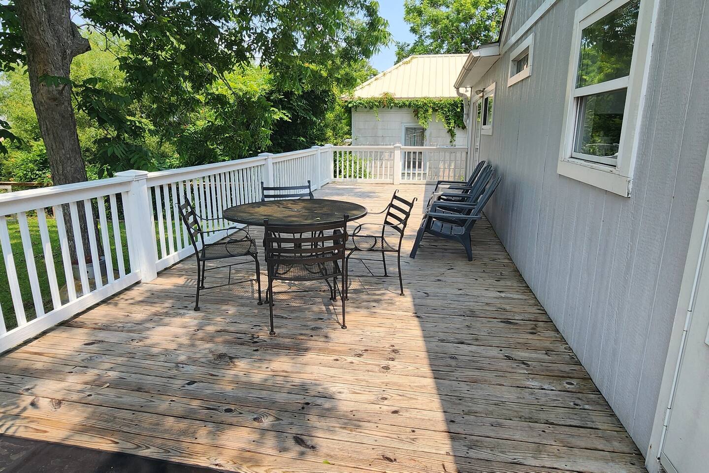Fisher Fun House with yard, deck, porch