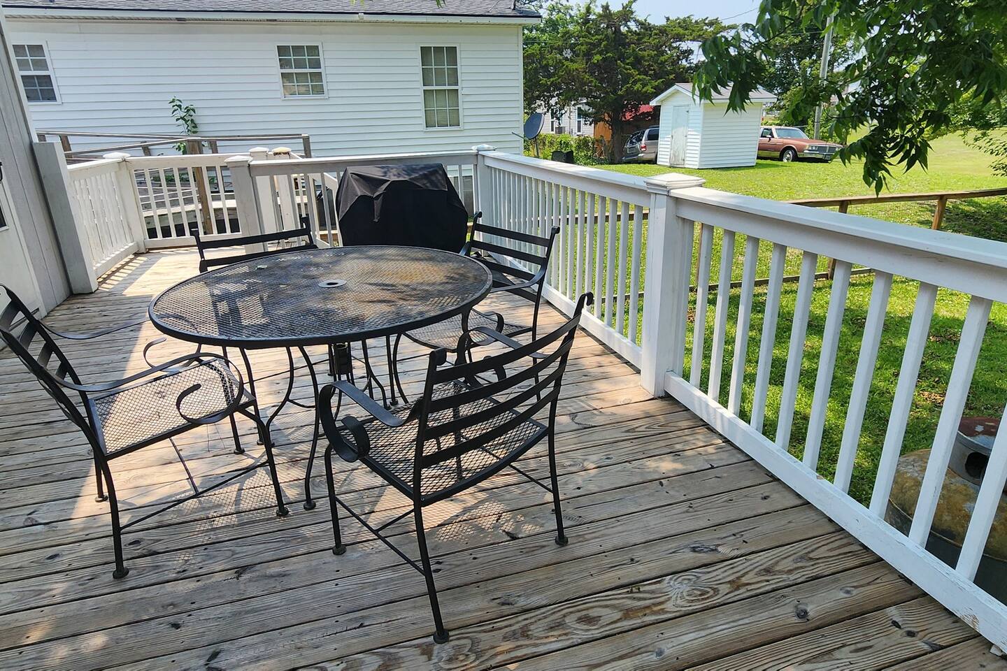 Fisher Fun House with yard, deck, porch