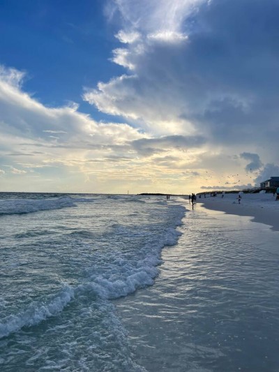 Private white-sand beach at Jetty East near The Sunset Lounge