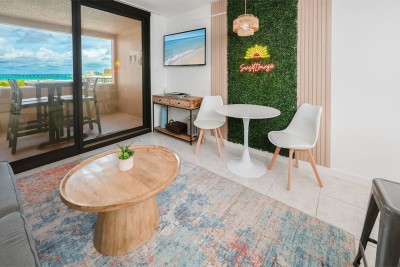 Coastal living room inside The Sunset Lounge, Jetty East Unit 404A